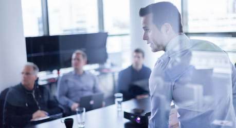 Business Team in Teleconferencing Meeting